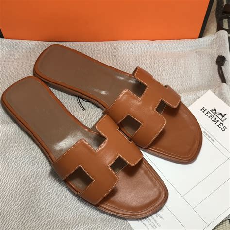 brown hermes slides|hermes fluffy slides.